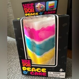 Viral~ Nee Doh Peace O' Cake Squishy Toy - Multicolor